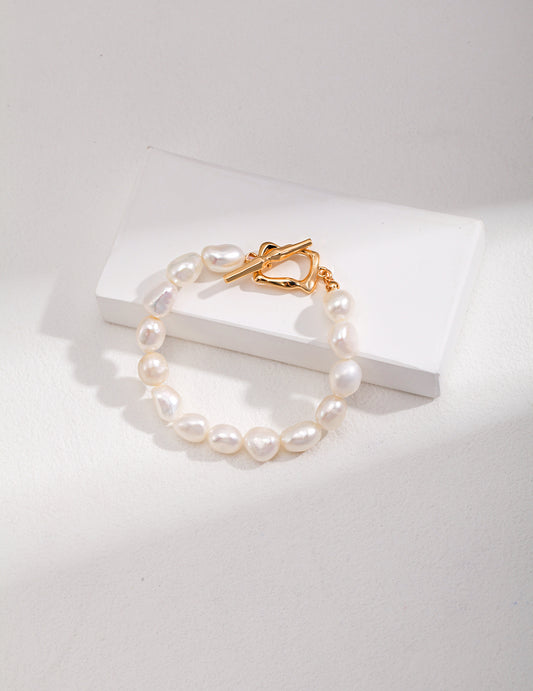 Gilded Tempest Pearl Bracelet